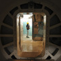A photo taken on Aug. 22, 2010, and released by the International Iran Photo Agency shows a worker standing at the entrance of the reactor of Bushehr nuclear power plant, outside the southern city of Bushehr, Iran. Work was stopped on the reactor to ascertain whether it had been affected by the Stuxnet computer virus — apparently developed in Israel with the help of the CIA.