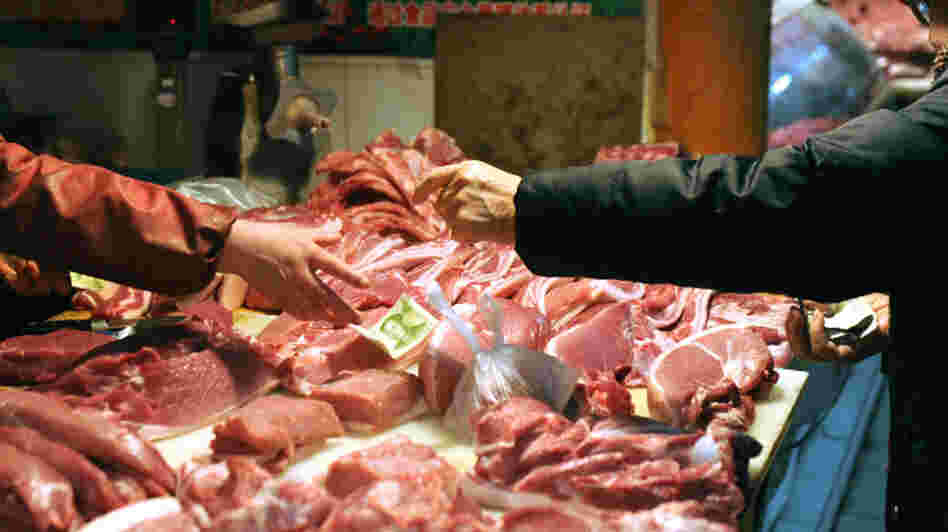 Pork is sold in a market in Beijing.