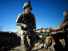 Cpl. Andrew Collins springs into action seconds after a rocket is fired at the outpost in Charkh, Afghanistan. Combat Outpost Charkh sees as much action as anywhere in Afghanistan, but it's in Logar province, not far from the capital, Kabul. Cpl. Andrew Collins springs into action seconds after a rocket is fired at the outpost in Charkh, Afghanistan. Combat Outpost Charkh sees as much action as anywhere in Afghanistan, but it's in Logar province, not far from the capital, Kabul.