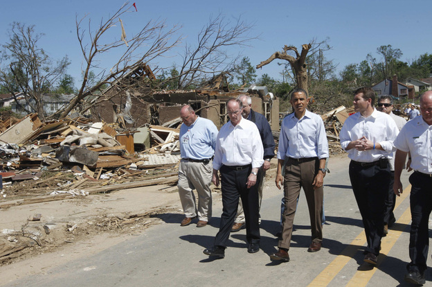 President Obama, flanked by Alabama Gov. Robert Bentley and Tuscaloosa, Ala., Mayor Walter Maddox, tours tornado damage in Tuscaloosa on Friday.