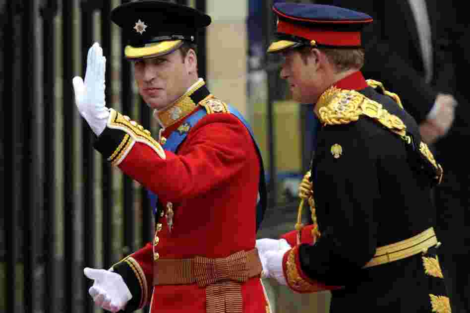 Britain's Prince William (left) waves as he arrives with his brother, Prince Harry, at Westminster Abbey. 