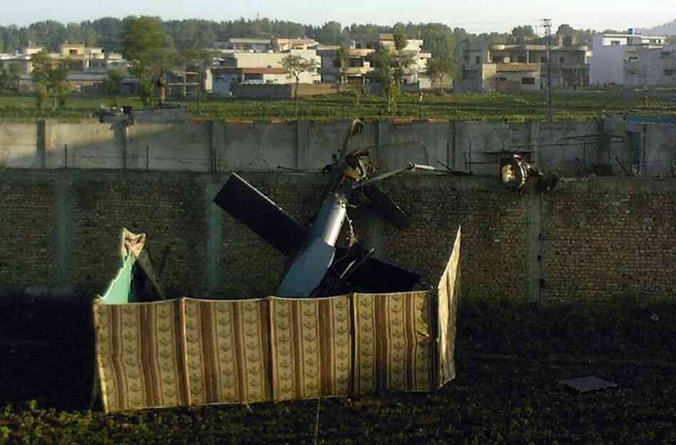 A U.S. military helicopter is seen near bin Laden's hideout after experiencing mechanical difficulties. There were no reported U.S. casualties. 