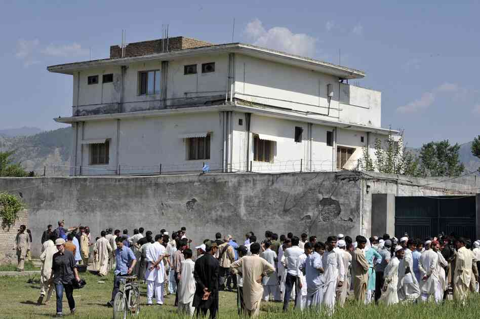 Pakistani media and local residents gather outside the compound. Revelations that bin Laden had been hiding here, possibly for years, have embarrassed Pakistan's military and intelligence establishment. 