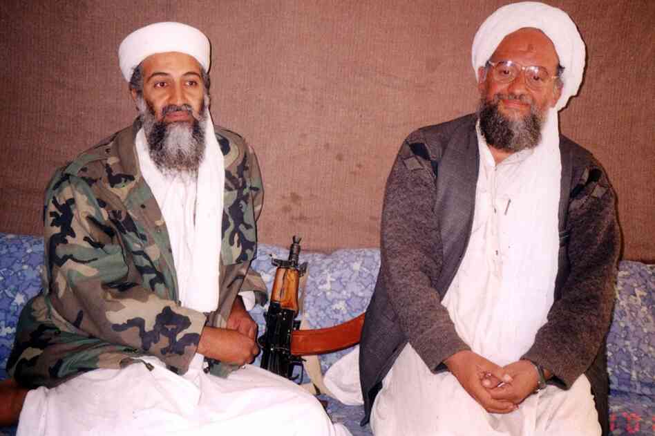 President George W. Bush demanded, to no avail, that Afghanistan's Taliban government turn over bin Laden or face war. In early October 2001, U.S. forces began striking Afghan targets. Bin Laden (left) sits with top adviser Ayman al-Zawahiri during an interview with a Pakistani journalist at an undisclosed location in Afghanistan that was published Nov. 10, 2001. 