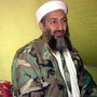 In this photo taken Dec. 24, 1998, Osama  bin Laden speaks to a selected group of reporters in the mountains of  Helmand province in southern Afghanistan.