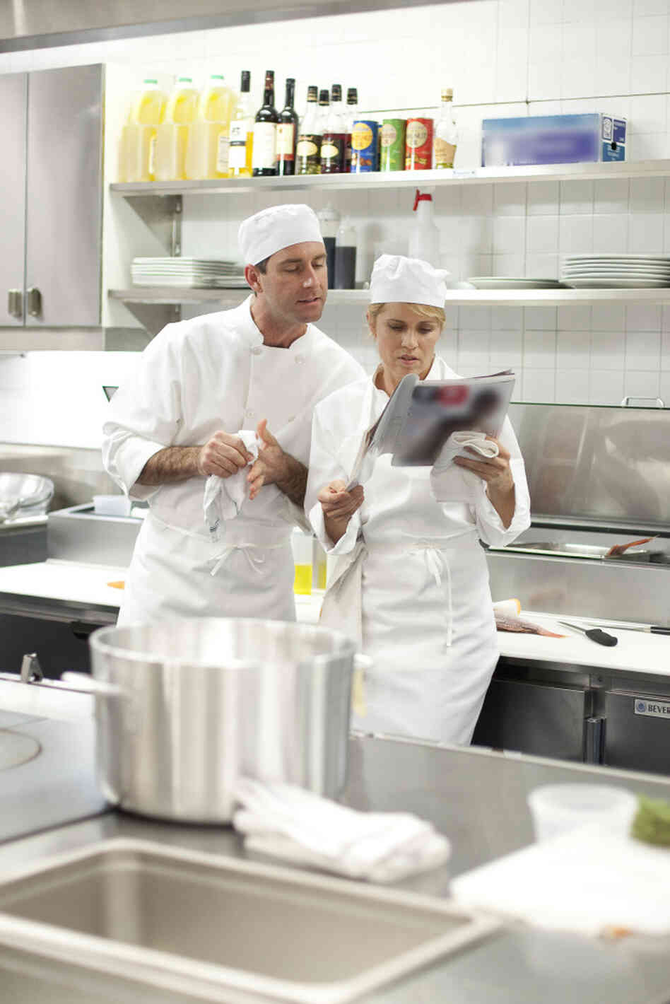 Janette (Kim Dickens) and her kitchenmate (Paul Fitzgerald) discuss Alan Richman's criticism of New Orleans culinary culture in GQ. Janette (Kim Dickens) and her kitchenmate (Paul Fitzgerald) discuss Alan Richman's criticism of New Orleans culinary culture in GQ.