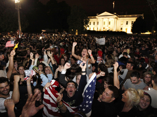 Crowds gathers outside the White House early Monday, May 2, 2011, to celebrate President Obama's announcement that U.S. troops killed Osama bin Laden.