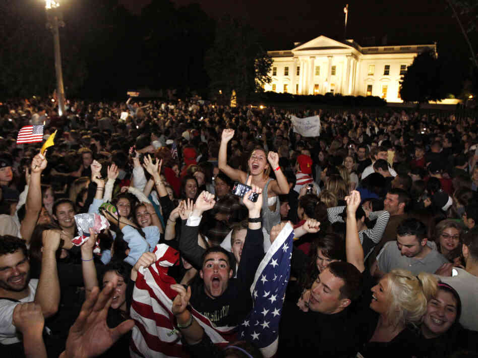 Crowds gathers outside the White House early Monday, May 2, 2011, to celebrate President Obama's announcement that U.S. troops killed Osama bin Laden.