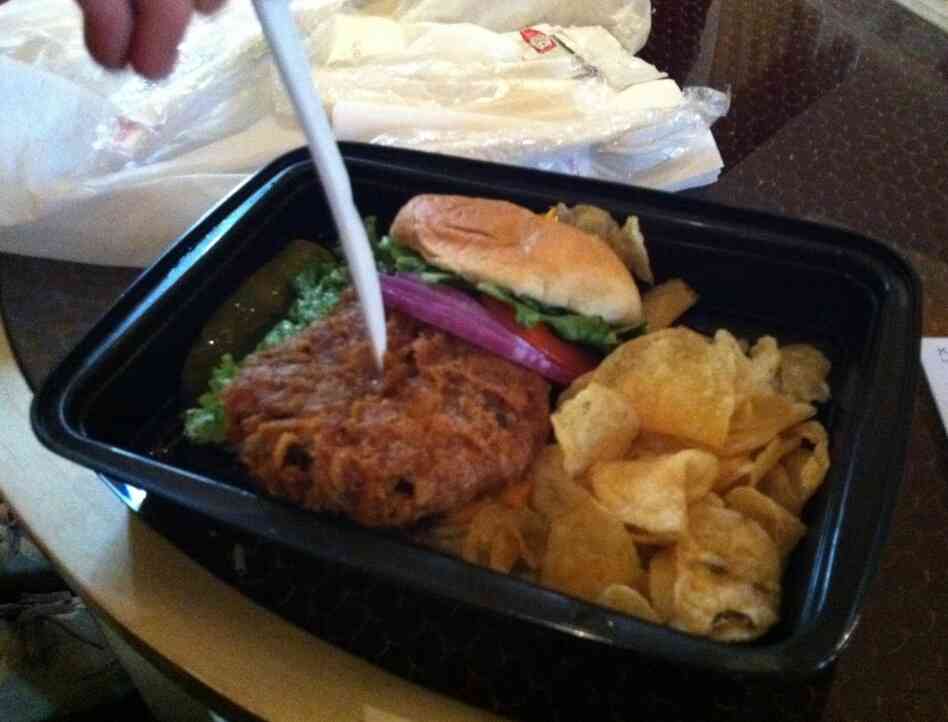The first step in the eating of this burger is to spear it. The first step in the eating of this burger is to spear it.