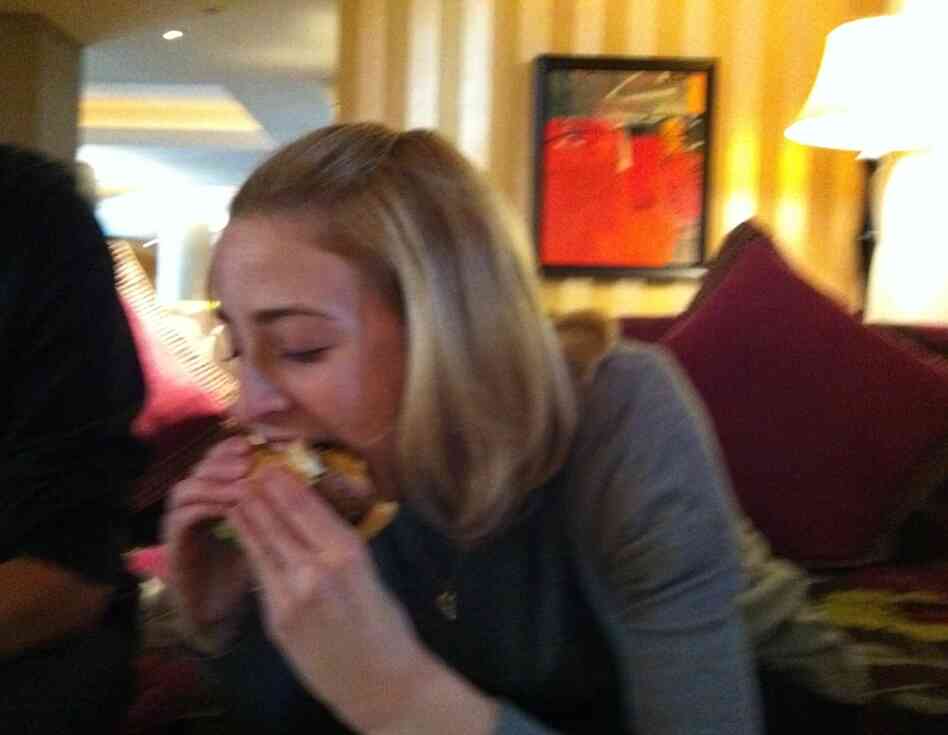 Here the burger is actually eating Eva. Here the burger is actually eating Eva.