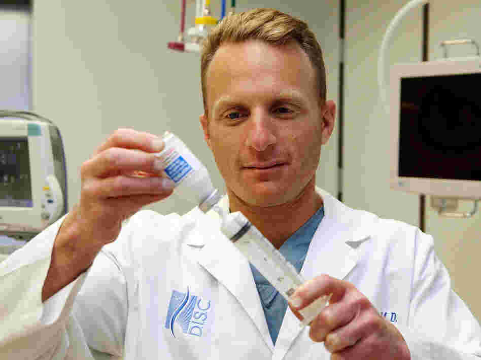 California anesthesiologist Michael Port fills a syringe with the anesthetic propofol in 2009.