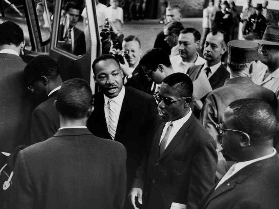 Dr. Martin Luther King Jr. sees off a group of Freedom Riders as they board a bus for Jackson, Miss., on May 24, 1961. Dr. Martin Luther King Jr. sees off a group of Freedom Riders as they board a bus for Jackson, Miss., on May 24, 1961.