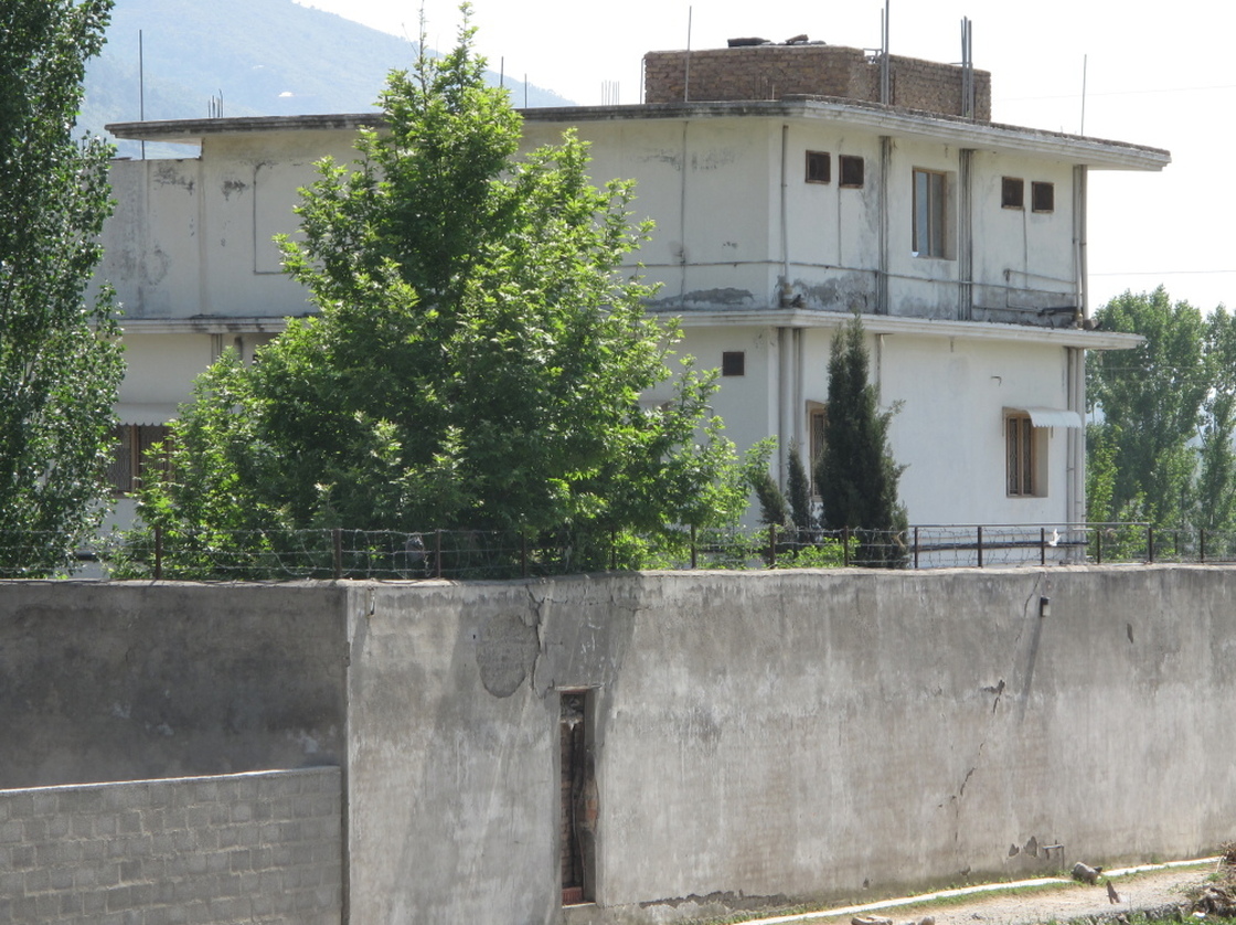 The bin Laden compound is surrounded by 20-foot walls and fortified by two feet of razor-wire fencing. The million-dollar hideout sits in Abbottabad, a garrison town that also houses the country's premier army training center.