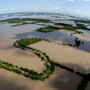 The Mississippi River floods north of New Madrid, Mo. The Mississippi River floods north of New Madrid, Mo.