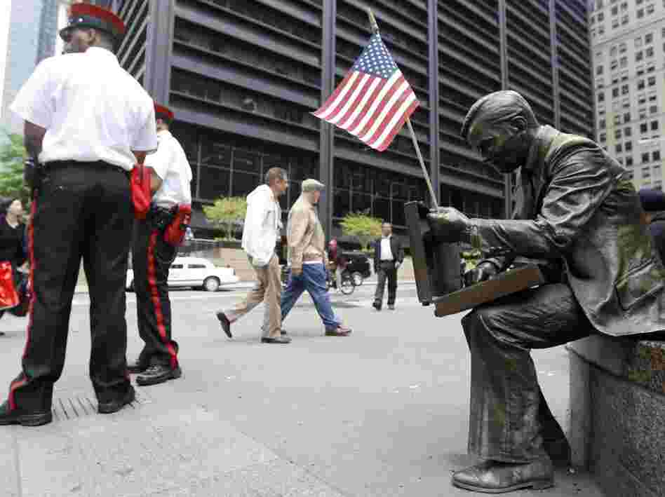 An American flag was placed on a statue near Ground Zero memorializing 9-11, May 3, 2011.
