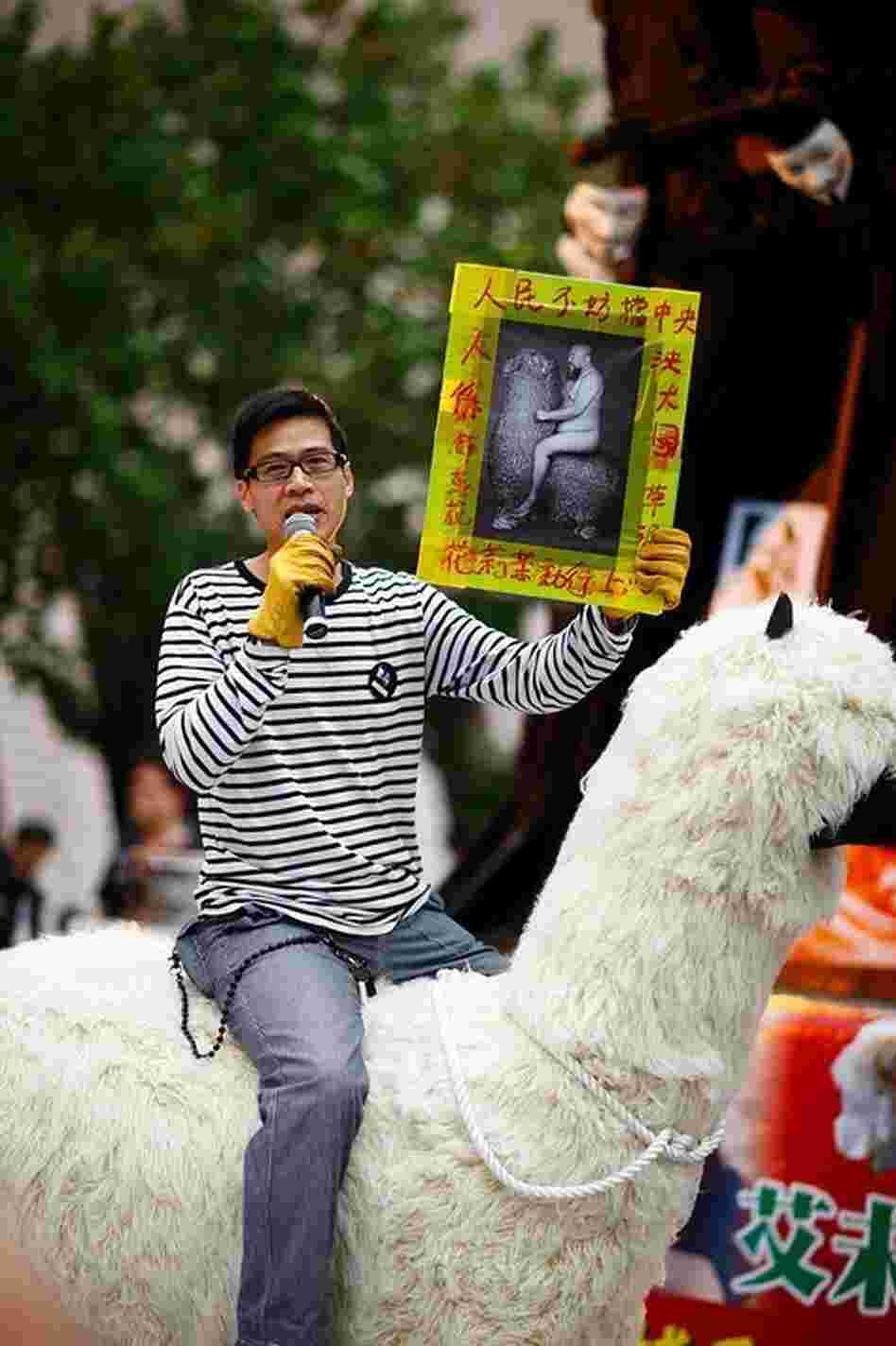 Kacey Wong, who helped organize a march in Hong  Kong in support of Ai Weiwei, took along a homemade 6-foot-tall Grass  Mud Horse, a mythical animal that Chinese netizens use as a way of  indirectly criticizing government censorship. In his hand, he holds a picture of Ai Weiwei riding his own Grass Mud Horse.