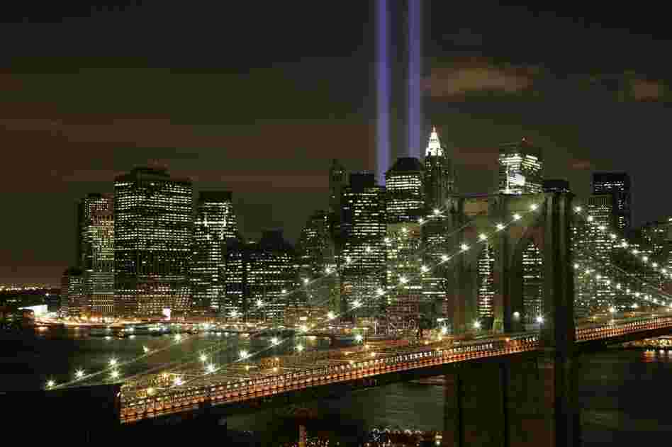 The Tribute in Light illuminates the sky over the Brooklyn Bridge and Lower Manhattan, Sept. 11, 2008. 