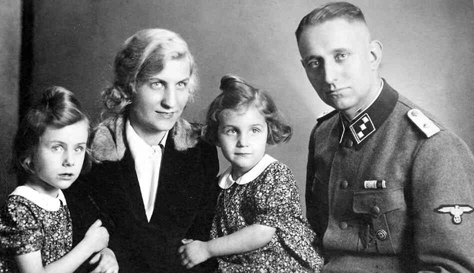 Uncovering A Secret Past: In a family portrait taken in 1941, Bruno Langbehn poses with his wife and children. It was not until after Langbehn's death, at 85, that his grandchildren learned he was not just a German dentist, but a dedicated Nazi and a member of Hitler's Schutzstaffel — the Nazis' chief paramilitary arm. Uncovering A Secret Past: In a family portrait taken in 1941, Bruno Langbehn poses with his wife and children. It was not until after Langbehn's death, at 85, that his grandchildren learned he was not just a German dentist, but a dedicated Nazi and a member of Hitler's Schutzstaffel — the Nazis' chief paramilitary arm.
