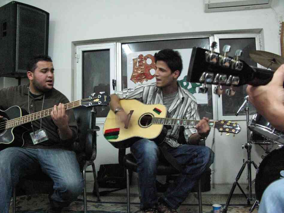 Guys Underground rehearses in space at the Media Center for the 17th of February Revolution in Benghazi, Libya. The band's songs aren't explicitly anti-Gadhafi; it aims to honor those who have died in the uprisings and lift the spirits of those still fighting, says Marwan Fathallah Ghargoum (left), the band's bassist and songwriter. Guys Underground rehearses in space at the Media Center for the 17th of February Revolution in Benghazi, Libya. The band's songs aren't explicitly anti-Gadhafi; it aims to honor those who have died in the uprisings and lift the spirits of those still fighting, says Marwan Fathallah Ghargoum (left), the band's bassist and songwriter.