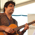 Rez Abbasi performs at the Newport Jazz Festival. Rez Abbasi performs at the Newport Jazz Festival.