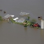 When the Army Corps of Engineers blasted part of a levee holding back the Mississippi River last week, floodwater poured over Missouri farmland and surrounded this farm near New Madrid, Mo.