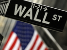 A sign for Wall Street is seen before the opening bell in this October 15 2009 file photo. A sign for Wall Street is seen before the opening bell in this October 15 2009 file photo.