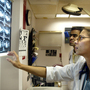 A doctor views CT scans in the emergency room at Coney Island Hospital in New York. A doctor views CT scans in the emergency room at Coney Island Hospital in New York.
