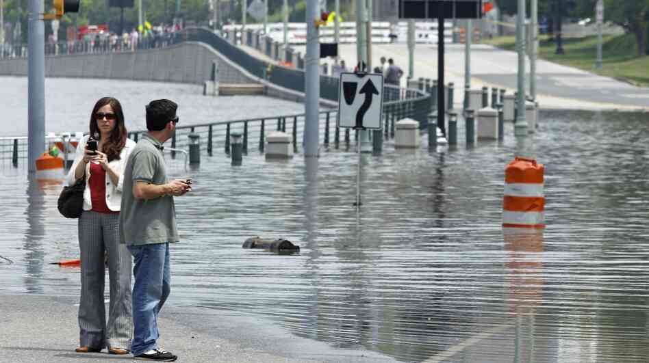 People view Mississippi River floodwaters on Sunday, May 8, 2011, in Memphis, Tenn.