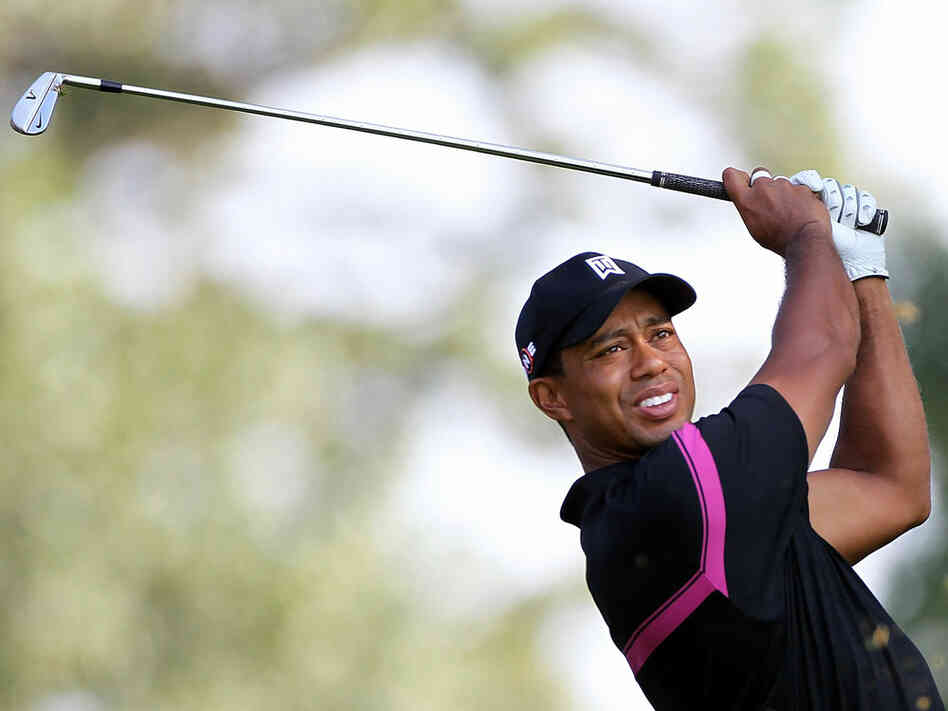 Tiger Woods finishes a tee shot on the 10th hole at the Barclays. Tiger Woods finishes a tee shot on the 10th hole at the Barclays.
