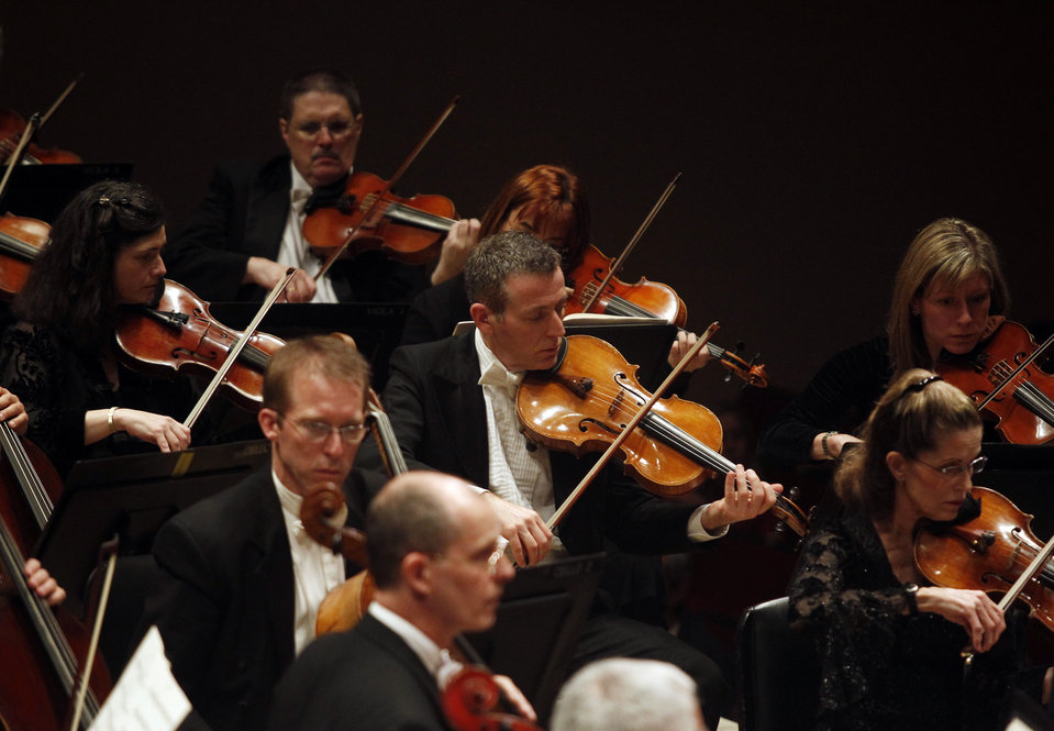 The Dallas Symphony Orchestra string section.