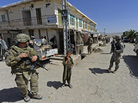 In this photo provided by ISAF Regional Command (South), members of Provincial Reconstruction Team Zabul and 1st Stryker Brigade Combat Team, 25th Infantry Division, make their way to the Zabul Juvenile Detention Facility on Wednesday in Qalat, Afghanistan. The effect of al-Qaida leader Osama bin Laden's death on the Afghan insurgency is yet to be seen. In this photo provided by ISAF Regional Command (South), members of Provincial Reconstruction Team Zabul and 1st Stryker Brigade Combat Team, 25th Infantry Division, make their way to the Zabul Juvenile Detention Facility on Wednesday in Qalat, Afghanistan. The effect of al-Qaida leader Osama bin Laden's death on the Afghan insurgency is yet to be seen.