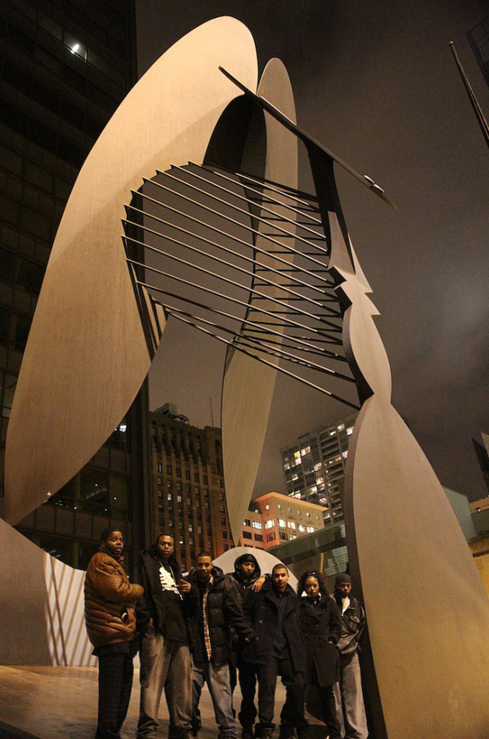 From left to  right, DJ Clent, Bobby Skillz, DJ Rashad, DJ Spinn, Gantman, Patricia  from Bang the Box and Traxman in front of the Picasso statue in Chicago.