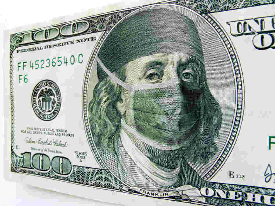 Ben Franklin wears a surgical mask on a $100 bill.
