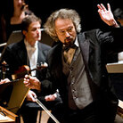 Conductor Carlos Kalmar leads the Oregon Symphony in music inspired by war. Conductor Carlos Kalmar leads the Oregon Symphony in music inspired by war.