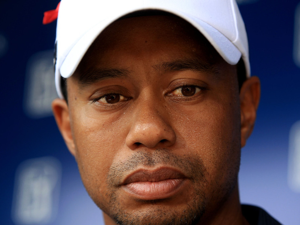 Tiger Woods talked with reporters after withdrawing from The Players Championship this morning.