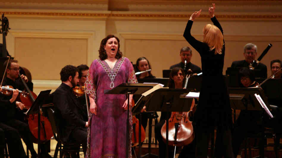 Composer Maria Schneider conducts soprano Dawn Upshaw and the Saint Paul Chamber Orchestra in her piece 'Carlos Drummond de Andrade Stories.' Composer Maria Schneider conducts soprano Dawn Upshaw and the Saint Paul Chamber Orchestra in her piece 'Carlos Drummond de Andrade Stories.'