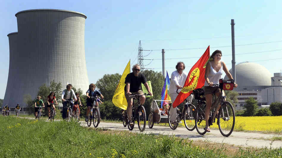 Protesters ride their bikes and hold flags reading "Nuclear power? No thanks" during a demonstration at the nuclear power plant of Biblis in Germany on April 25. Germany canceled plans to build new plants in the aftermath of the nuclear disaster in Japan.