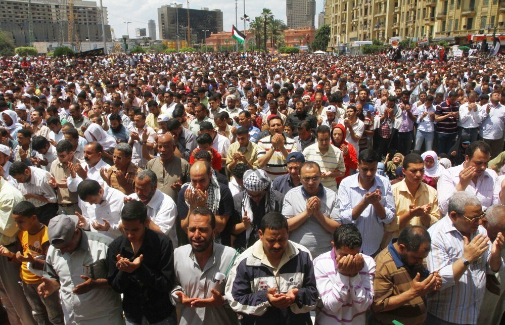 Egyptians say Friday prayers at a rally in Cairo's Tahrir Square on Friday. The rally called for national unity after attacks on Egyptian churches.
