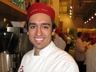 Brandon Smith is graduating from Columbia College in Chicago. He works part time at a sandwich shop downtown. Smith's college loans total $98,000, and he expects them to go higher. Brandon Smith is graduating from Columbia College in Chicago. He works part time at a sandwich shop downtown. Smith's college loans total $98,000, and he expects them to go higher.