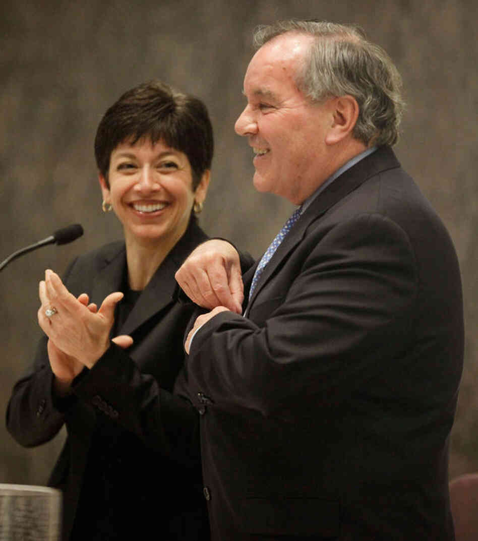Mara Georges, the city's corporation counsel, applauds Daley as he presides over his final City Council meeting on May 4. 