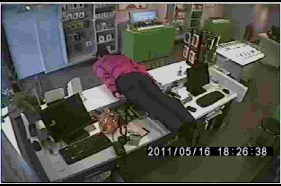 planking on an office desk. planking on an office desk.