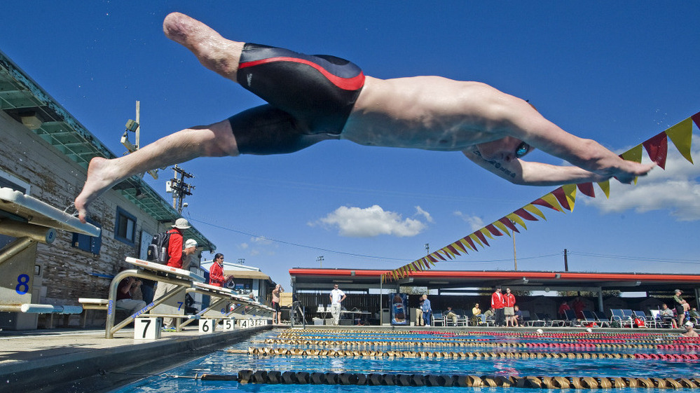 Nicholas Gibbons, a single amputee with the British Royal Marines team, takes off from the blocks during practice Feb. 21 in Camp Pendleton, Calif., for the inaugural Marine Corps Trials. Fifty athletes were chosen as members of the All-Marine team for the Warrior Games.