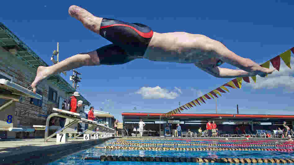 Nicholas Gibbons, a single amputee with the British Royal Marines team, takes off from the blocks during practice Feb. 21 in Camp Pendleton, Calif., for the inaugural Marine Corps Trials. Fifty athletes were chosen as members of the All-Marine team for the Warrior Games.
