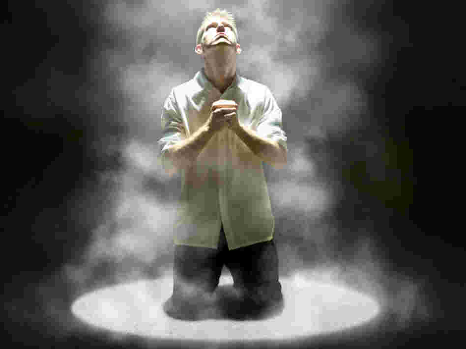 Male looks up in prayer. Male looks up in prayer.