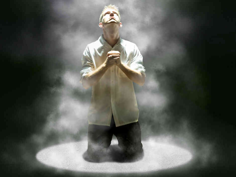 Male looks up in prayer. Male looks up in prayer.