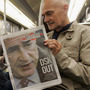 The arrest of the IMF chief and French presidential hopeful Dominique Strauss-Kahn ricocheted through the French political world. Riders of the Paris subway Monday read news coverage of the arrest.