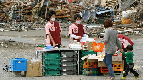 Takashi Watanabe at work at his store.