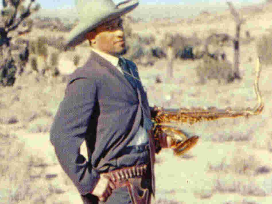 William Claxton's cover photo of Sonny Rollins standing in the desert — sporting a cowboy hat, gun holster and humorously knowing look — has only added to Way Out West's classic status.
