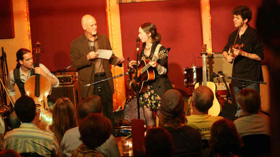 From left, Nathaniel Smith, WFUV's John Platt, Sarah Jarosz and Alex Hargreaves pause during Jarosz's show at The Living Room
