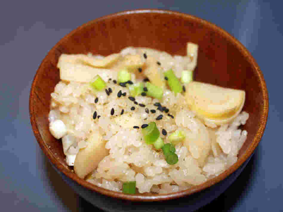 Japanese ex-pats are especially nostalgic for the popular dish of Steamed Rice with Bamboo Shoots (Takenoko Gohan), accented here with ground sansho pepper and black sesame seeds.